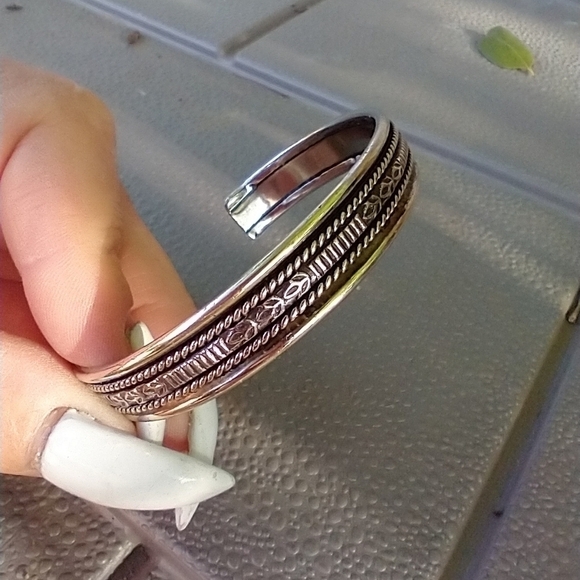 Women's silver tone decorative cuff bracelet. - Picture 3 of 4